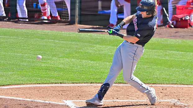 Feb 29, 2024; Tempe, Arizona, USA; Cleveland Guardians right fielder Chase DeLauter (6) grounds out in the third inning against the Los Angeles Angels during a spring training game at Tempe Diablo Stadium.